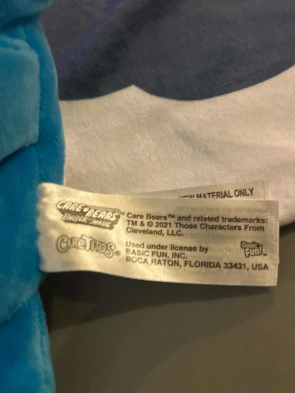Care Bears Grumpy Bear Blue Plush with Rainbow Wrap